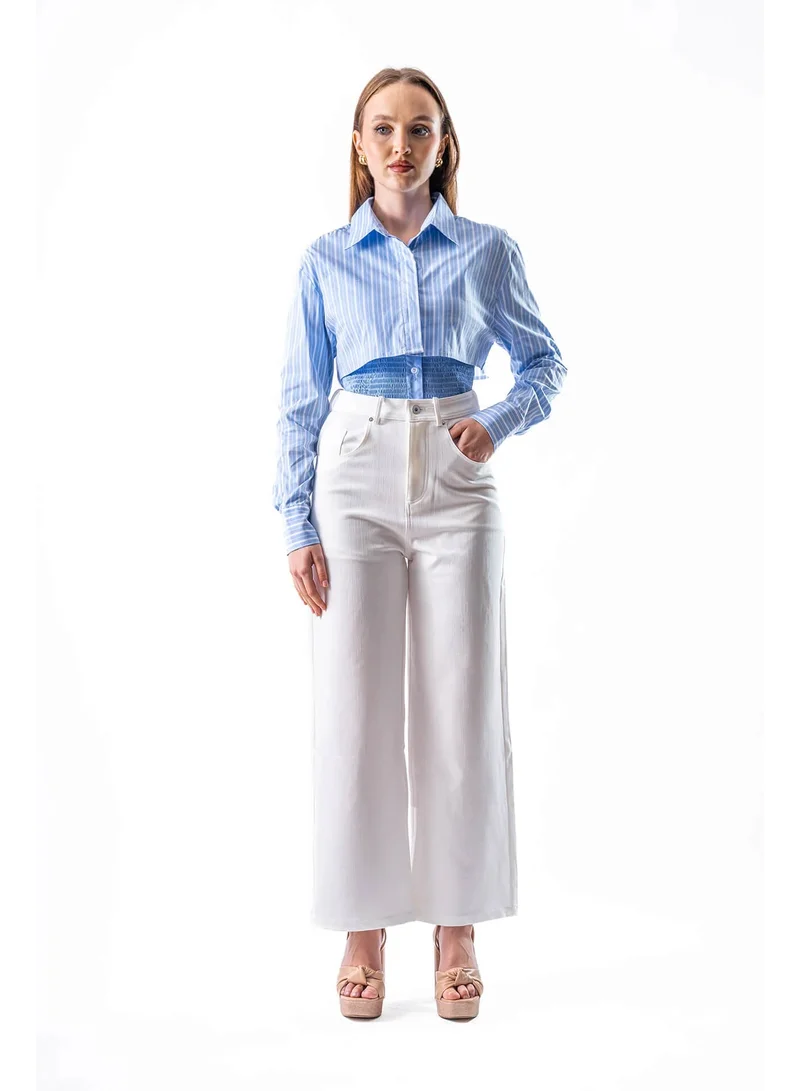 توترندس توب أزرق أنيق بقصة قصيرة